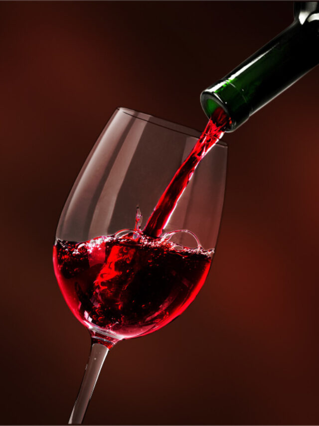 red-wine-being-poured-wineglass-closeup