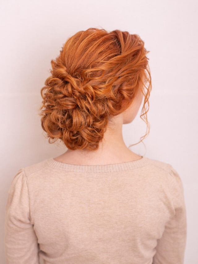 female-back-with-red-hairstyle-hairdressing-salon-background