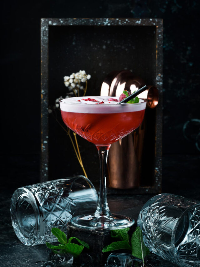 raspberry-margarita-cocktail-with-raspberry-liqueur-glass-bar-menu-black-background