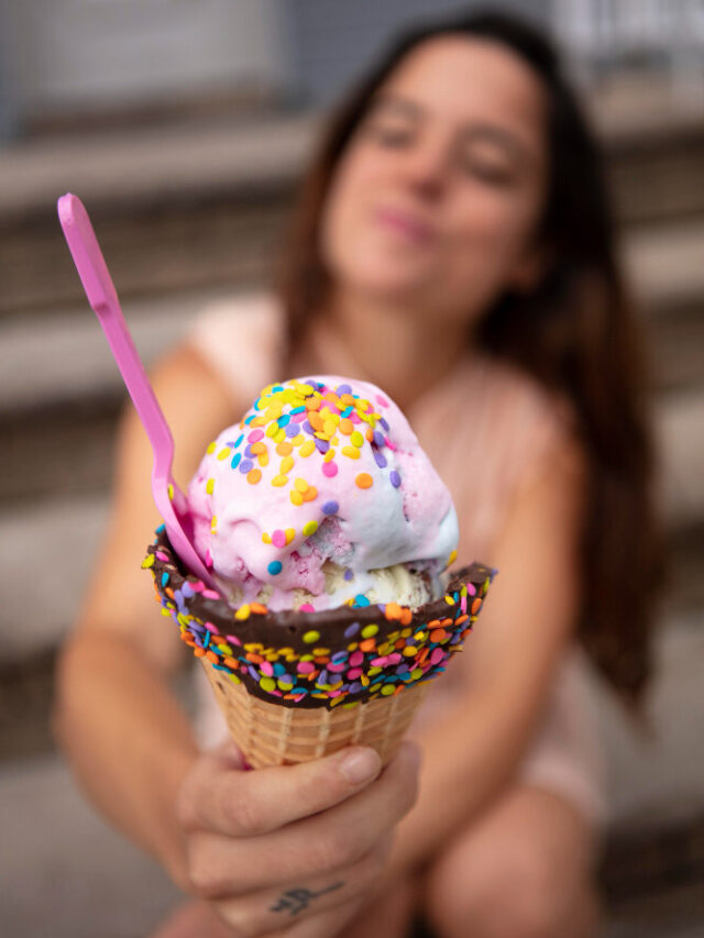 young-woman-tolerating-heat-wave-while-eating-ice-cream (1)